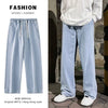 Fashionable men&#39;s streetwear including baggy wide leg jeans, oversized zip hoodie, and big watches for casual wear7